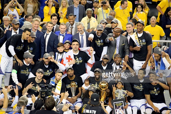 OAKLAND, CA - JUNE 12:  The Golden State Warriors celebrate after winning Game Five of the 2017 NBA Finals against the Cleveland Cavaliers on June 12, 2017 at ORACLE Arena in Oakland, California. NOTE TO USER: User expressly acknowledges and agrees that, by downloading and or using this photograph, user is consenting to the terms and conditions of Getty Images License Agreement. Mandatory Copyright Notice: Copyright 2017 NBAE (Photo by Bruce Yeung/NBAE via Getty Images)